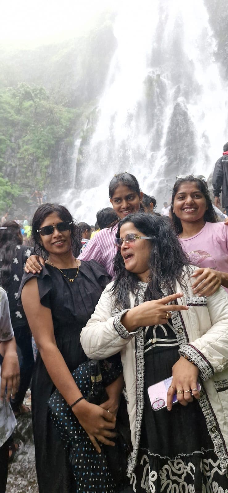 Getting drenched at the falls and loving every second