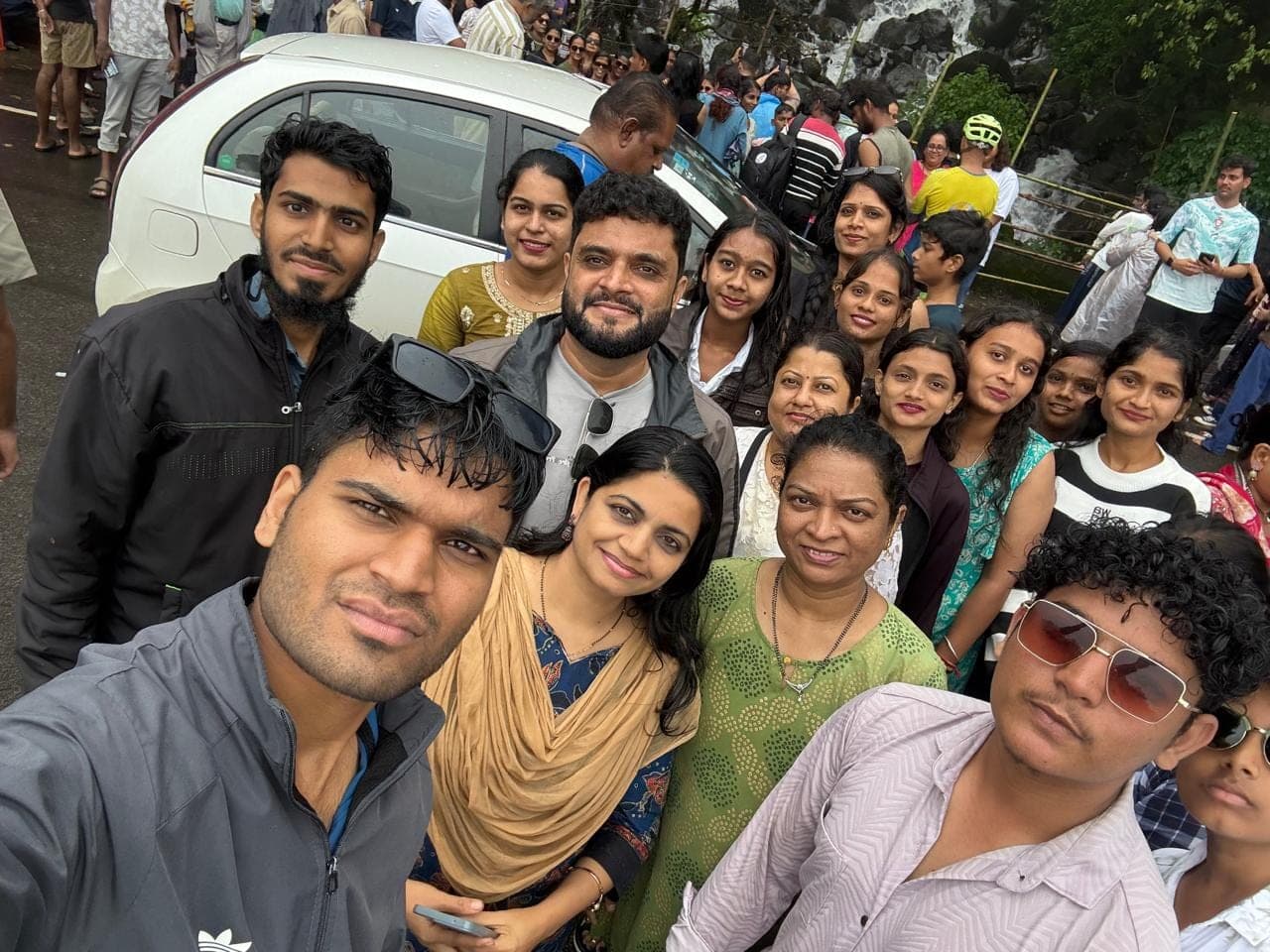 Piling in for one more group selfie